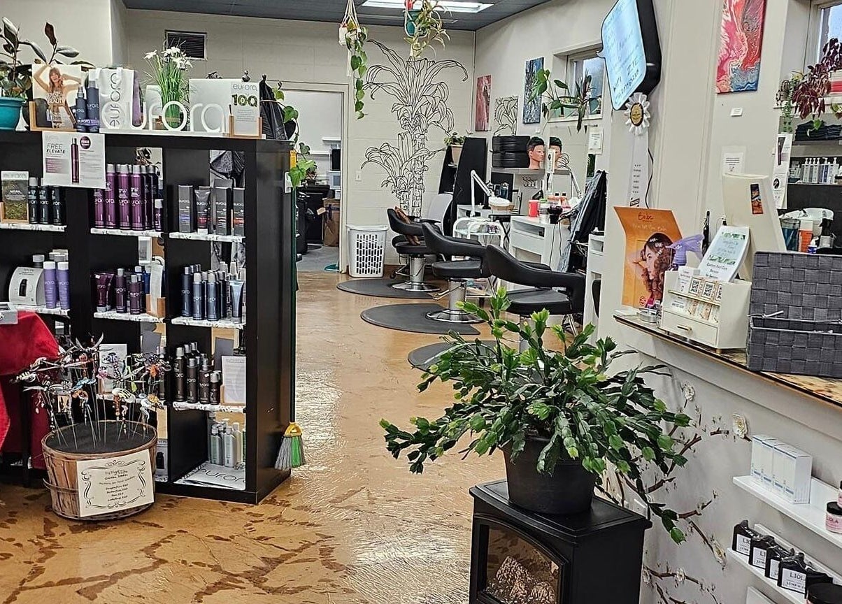 Interior of Canopy Salon and Spa, Innisfail, Alberta, CA featuring styling stations and products.