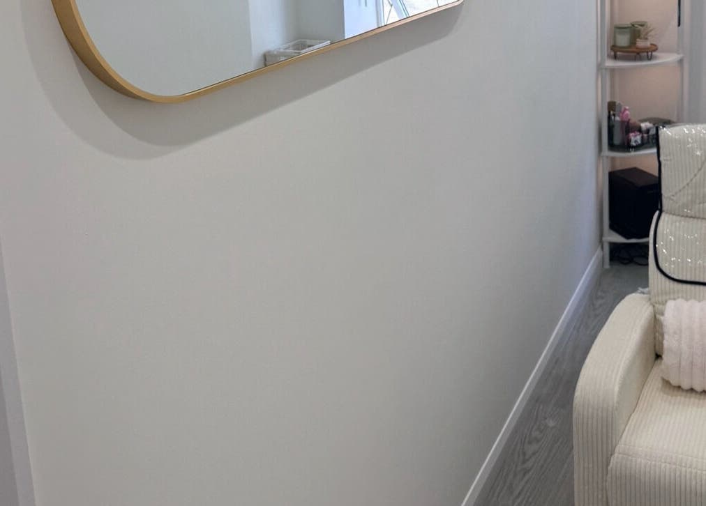 Sleek interior with a plush chair at Contoured by Isabel in Hull, England, GB, exudes a relaxing ambiance.