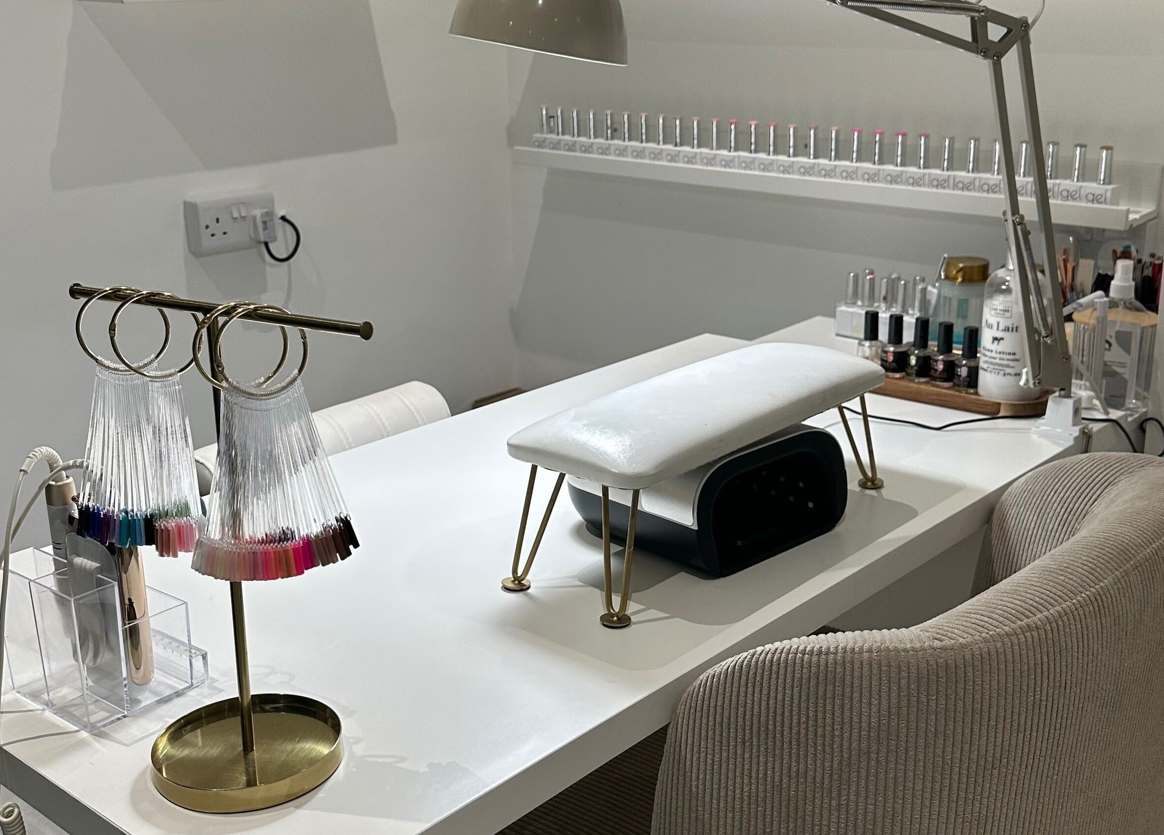 Stylish nail station at Gloss by PTB in Totton, England, GB, featuring modern decor and manicure tools.