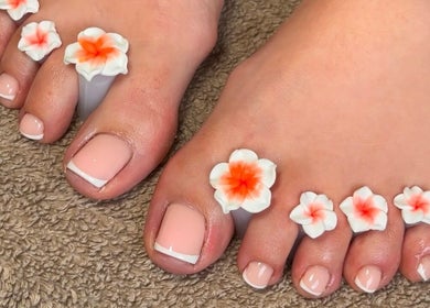 Elegant pedicure with floral accents at Gloss by PTB in Totton, England, GB. Perfect for a refreshing beauty treat.