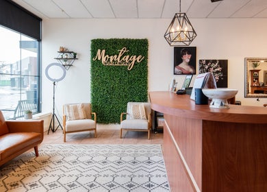 Chic interior of Montage Hair Design in Williamsville, New York, US, featuring modern seating and decor.