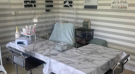 Chic nail treatment area at Care Love Pamper Limited in Frodsham, England, GB with sleek decor and equipment.