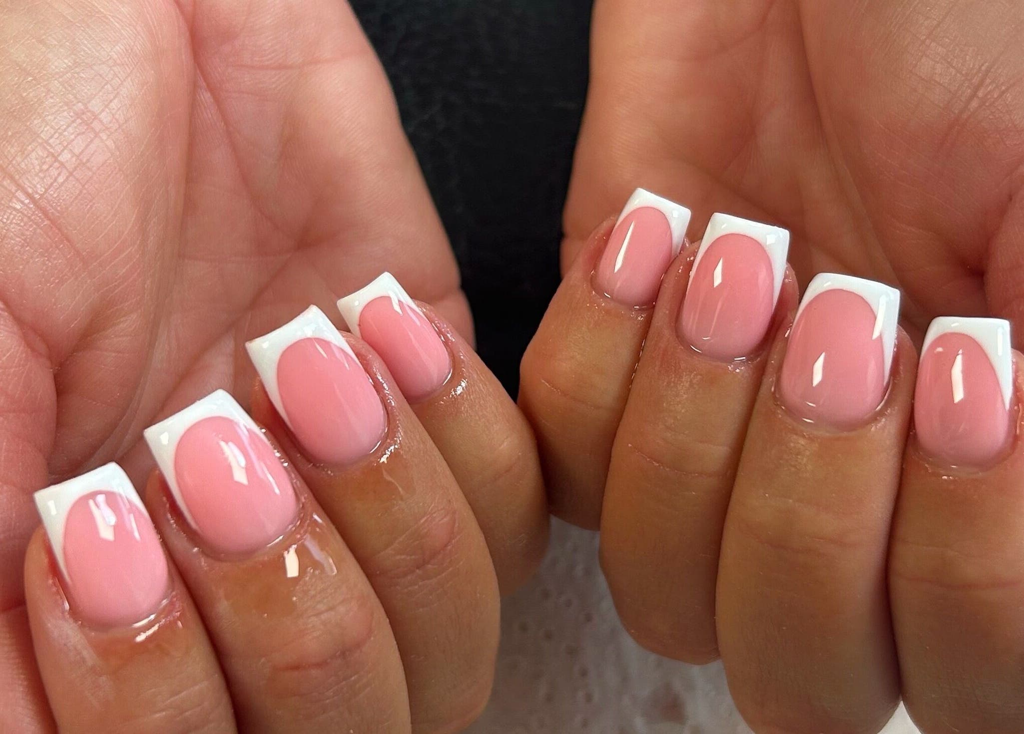 Stylish French manicure nails at Infinite by Charlie Millard, Polesworth, England, GB.
