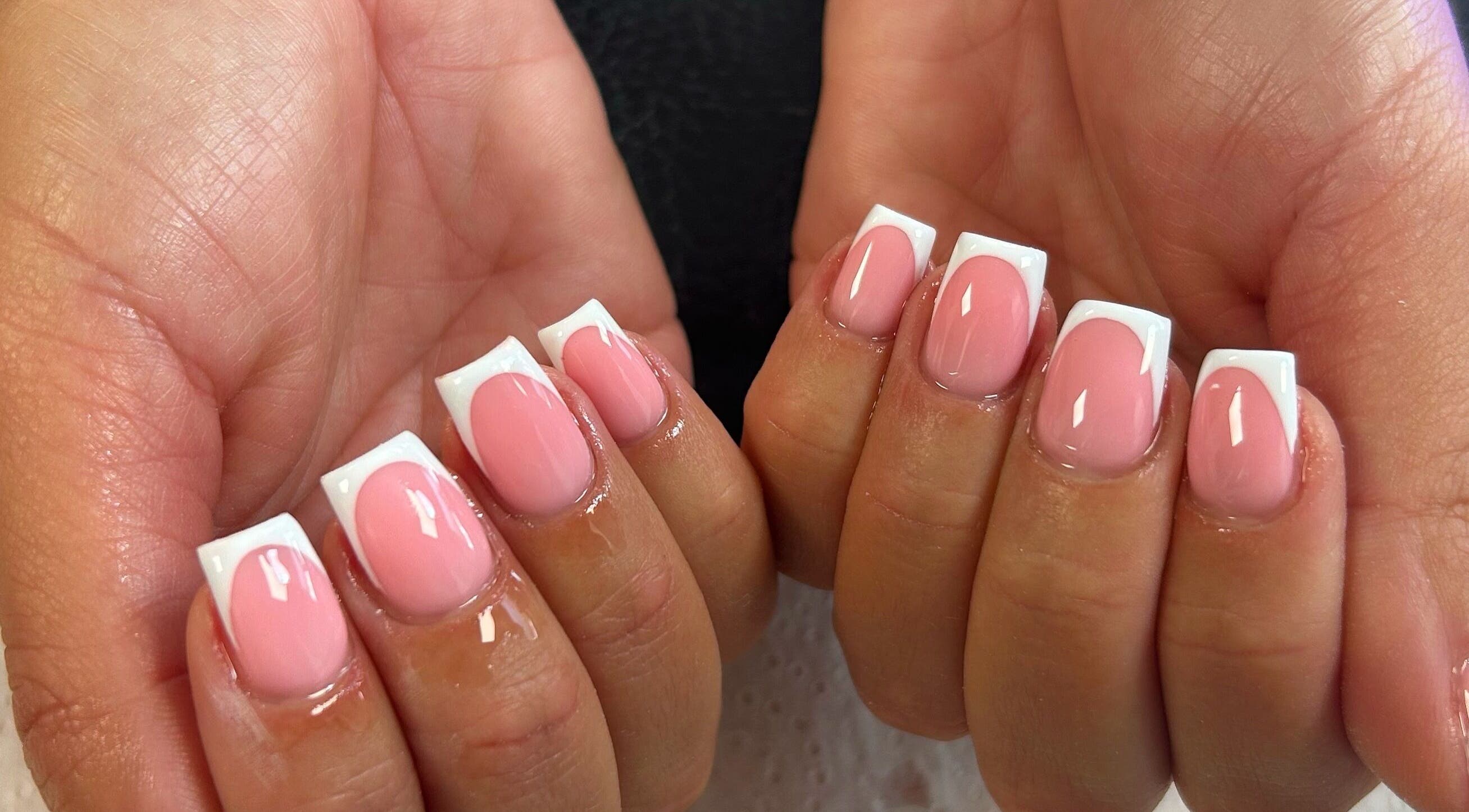Stylish French manicure nails at Infinite by Charlie Millard, Polesworth, England, GB.