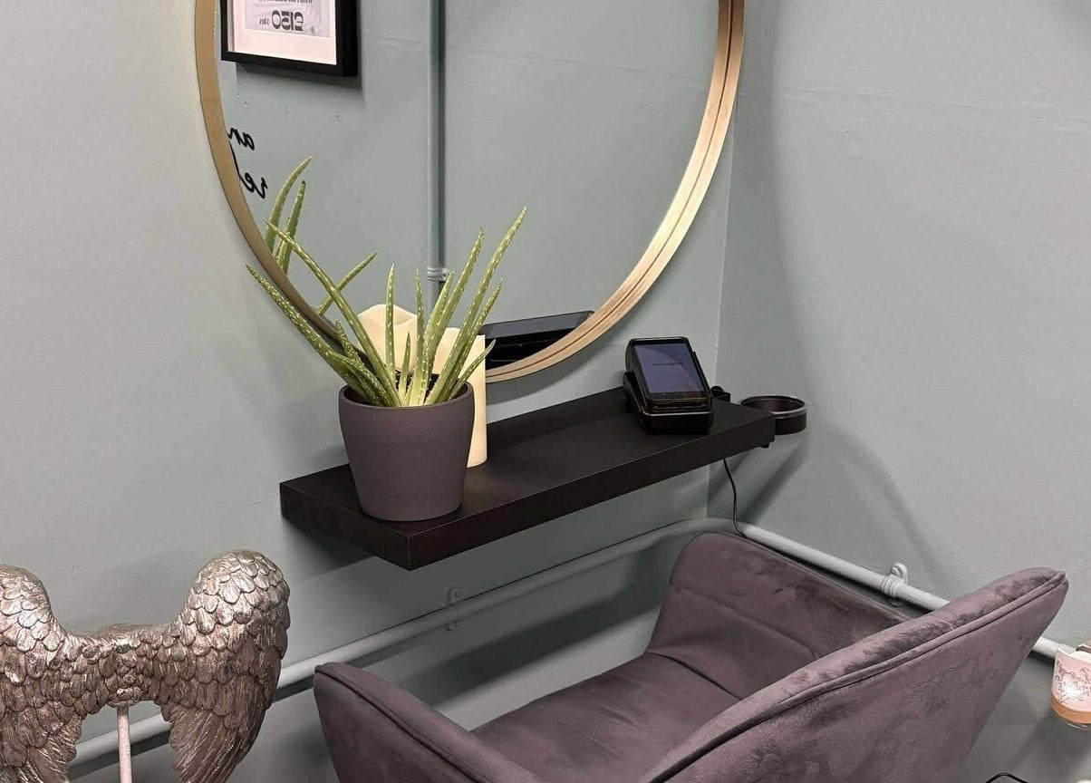 Relaxing corner with aloe plant and angel decor at Holistic Health NI, Carrickfergus, Northern Ireland, GB.