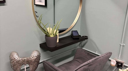 Relaxing corner with aloe plant and angel decor at Holistic Health NI, Carrickfergus, Northern Ireland, GB.