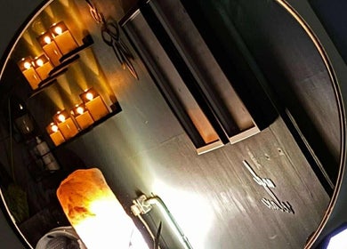Candle-lit ambience at Holistic Health NI, Carrickfergus, Northern Ireland, GB featuring warm lighting.