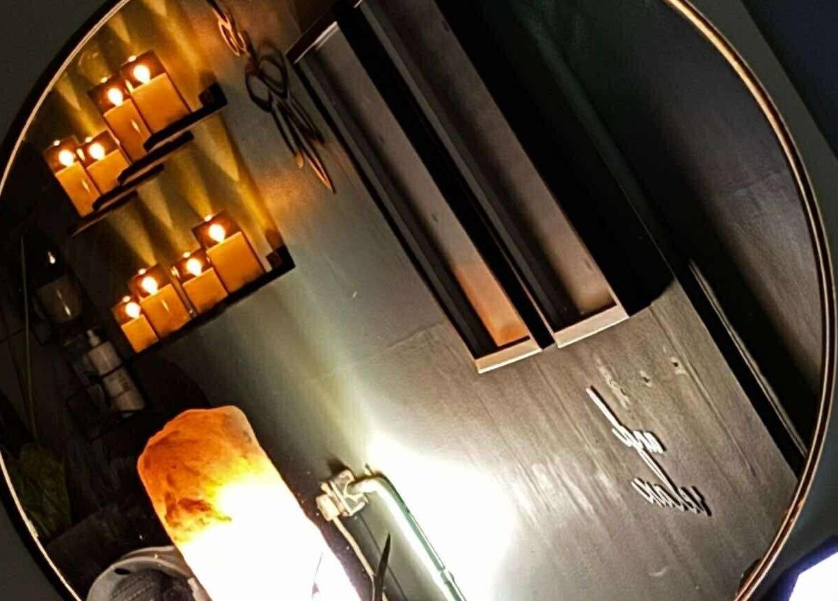 Candle-lit ambience at Holistic Health NI, Carrickfergus, Northern Ireland, GB featuring warm lighting.