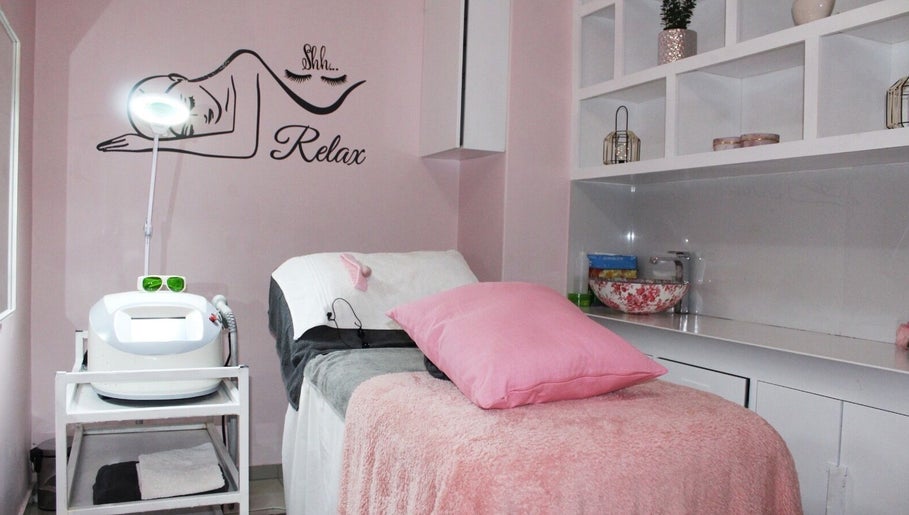 Elegant treatment room at Laser Hair Removal Lansdowne/Rosa beauty spa, Cape Town, Western Cape, ZA, with cozy decor.