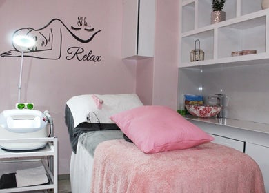 Elegant treatment room at Laser Hair Removal Lansdowne/Rosa beauty spa, Cape Town, Western Cape, ZA, with cozy decor.