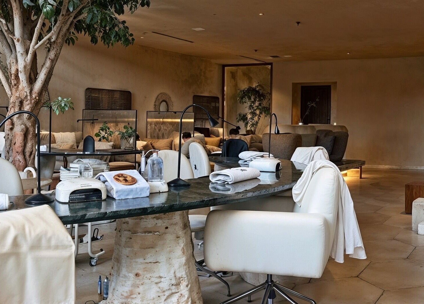 Peaceful interior of Kaia Spa - Ar Rayyan, Riyadh, Riyadh Province, SA, featuring natural decor and cozy seating.