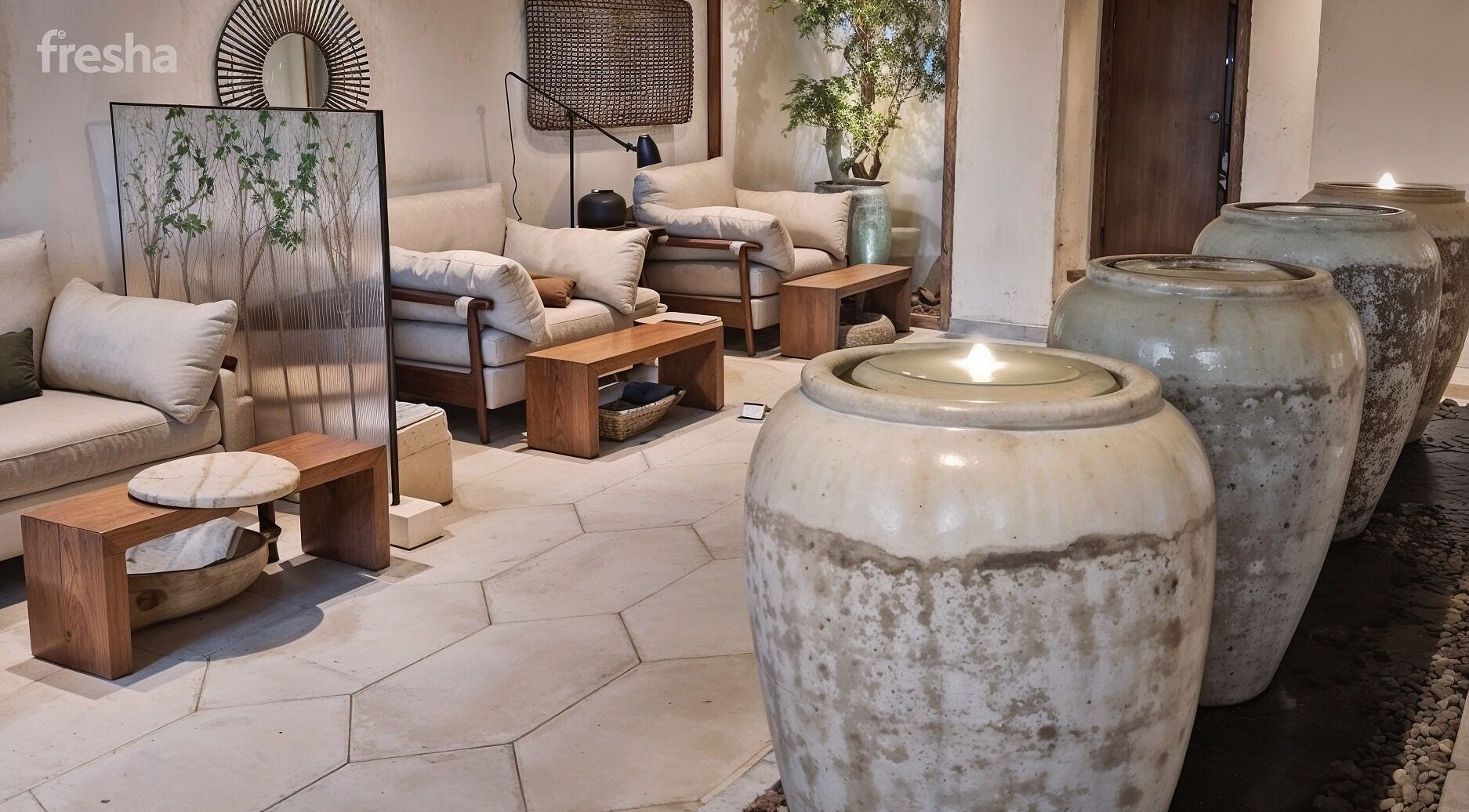 Relaxing reception area at Kaia Spa - Ar Rayyan, Riyadh, with plush seating and ambient lighting.