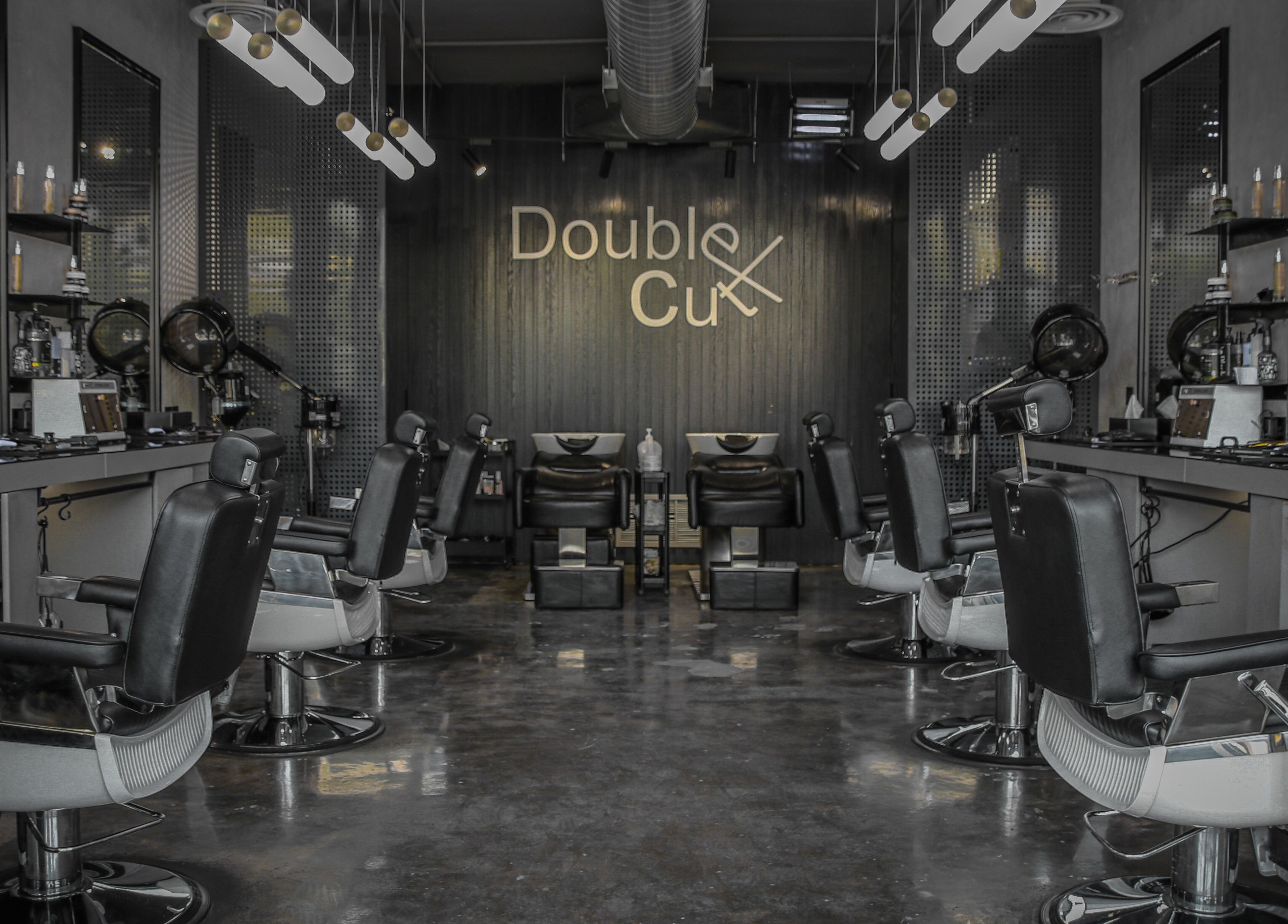 Sleek interior of Double Cut Barbershop | صالون دبل كت in Riyadh, Riyadh Province, SA with modern barber chairs.