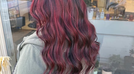 Stylish crimson hair waves at Myrna Hastings Haair, Indian Head, Saskatchewan, CA.