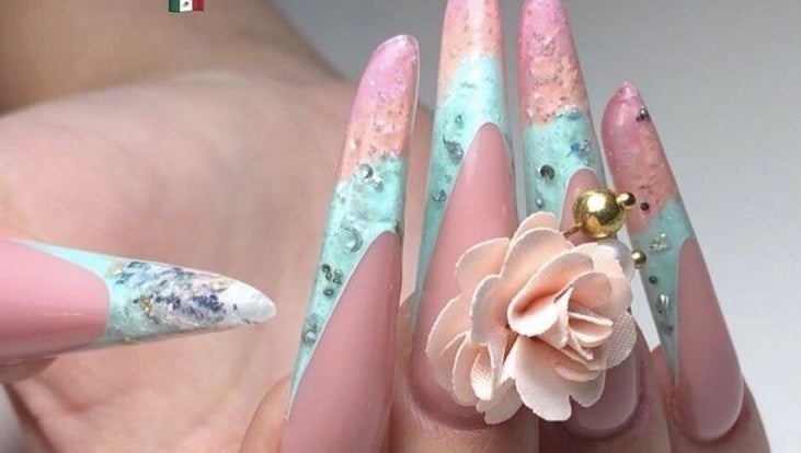 Intricate nail art by Charlene du Toit - The Nail Lady in Kitwe, Copperbelt Province, ZM. Pastel designs with embellishments.