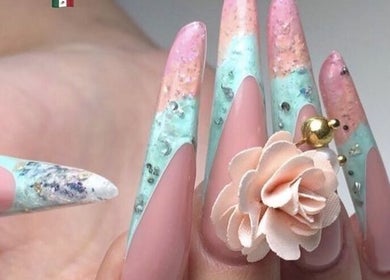 Intricate nail art by Charlene du Toit - The Nail Lady in Kitwe, Copperbelt Province, ZM. Pastel designs with embellishments.