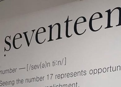 Wall art reading 'seventeen' at Laura Mc Ginley Hairdressing, Strabane, Northern Ireland, GB.