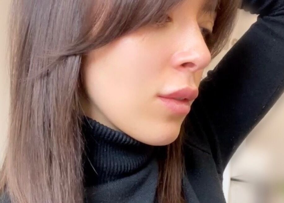 Side profile view at Ulyana Azarova, Den Haag, Zuid-holland, NL showcasing sophistication and style.