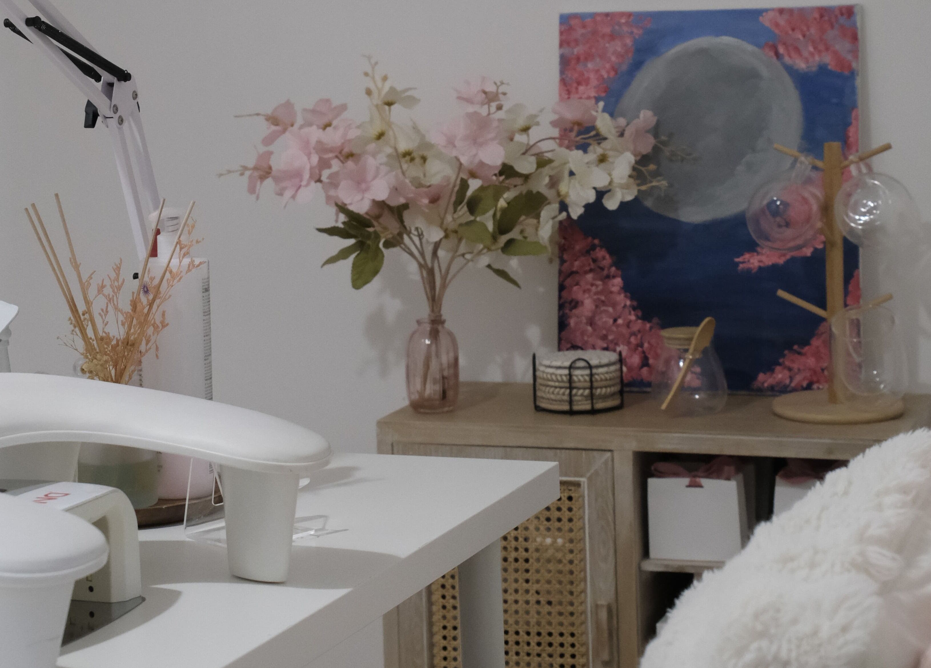 Relaxing floral setup at LV Nails, Feltham, England, GB highlighting nail care ambiance.