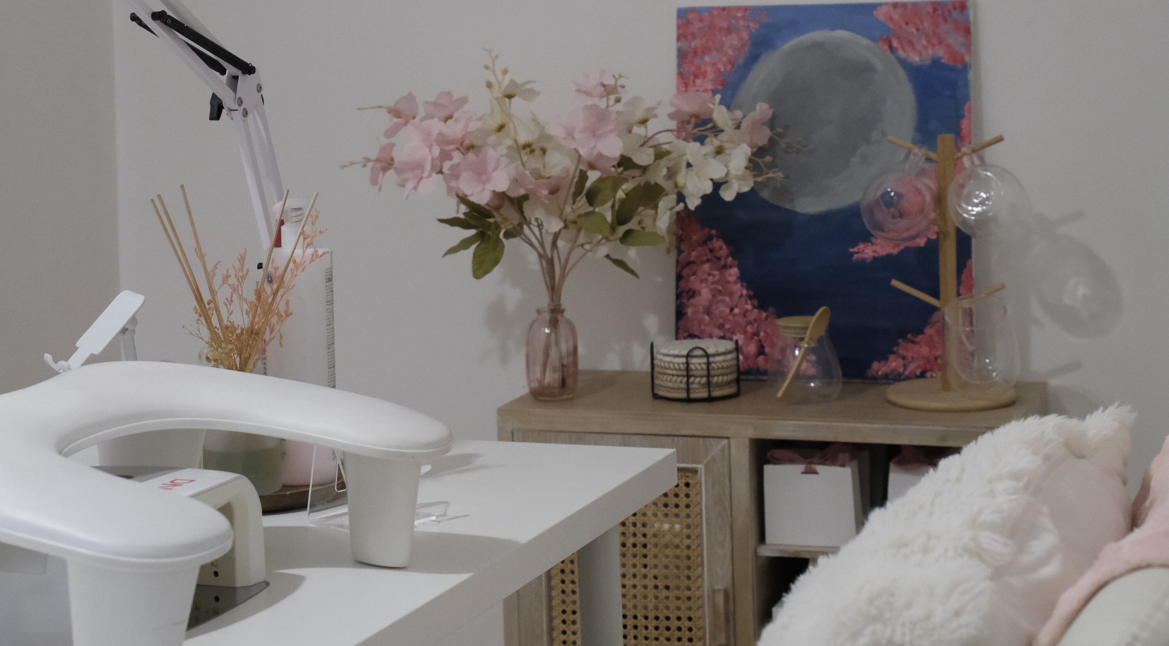 Relaxing floral setup at LV Nails, Feltham, England, GB highlighting nail care ambiance.