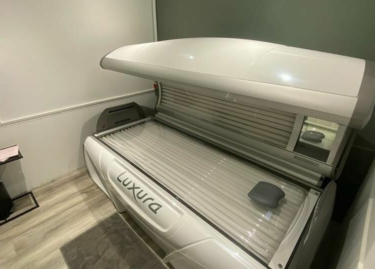 Modern tanning bed at Harmony in Brentwood, England, GB offers a luxurious sunbed experience.