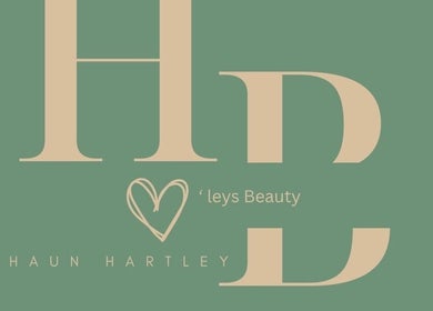 Hartley’s Beauty logo in green and beige, located in Lafayette, Louisiana, US.