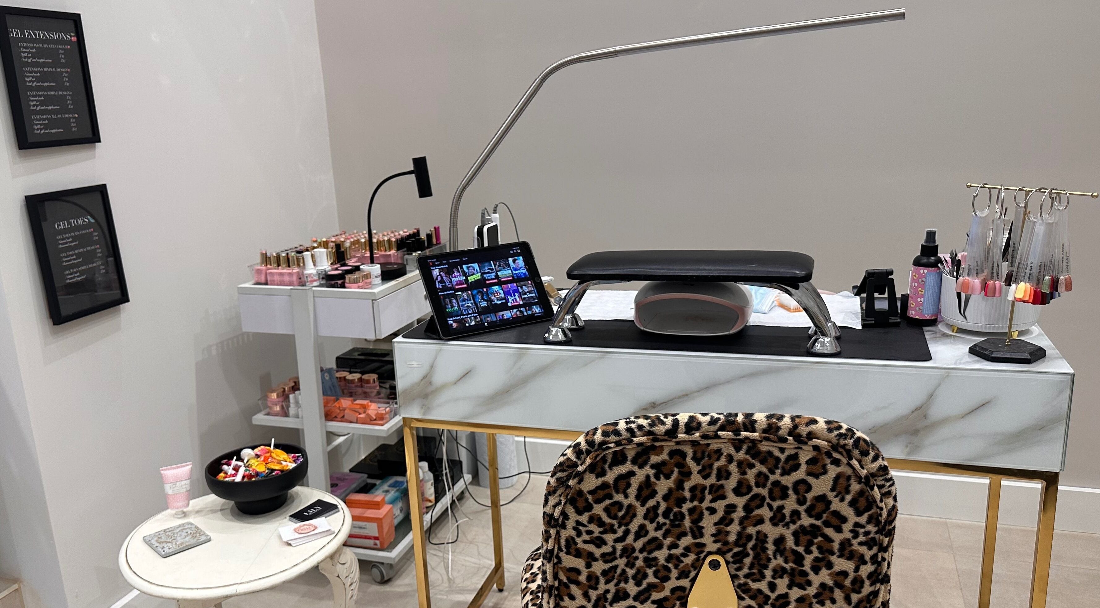 Lily the Nail Tech's stylish nail station in Wraxall, GB with tools and polish displayed.