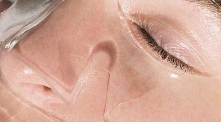 Refreshing facial treatment at Mnmlsm Beauty in Toronto, Ontario, CA, enhancing skin hydration and glow.