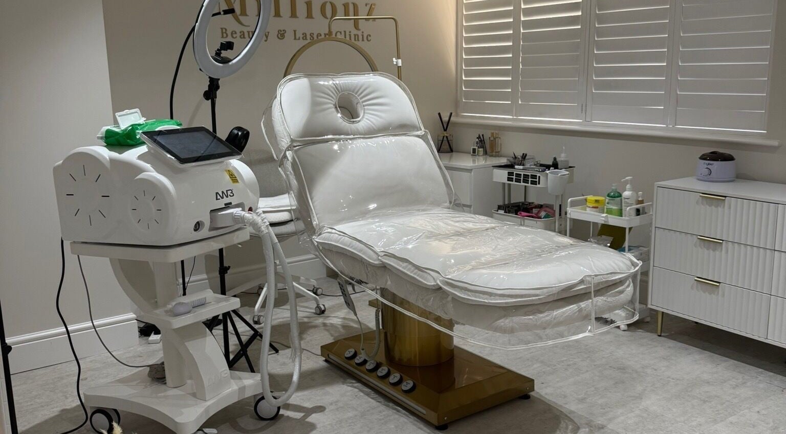 Luxury treatment room at Millionz Beauty, Crawley, England, GB featuring modern equipment and a plush chair.
