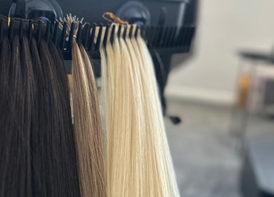 Hair extensions display at Hair By Ayesha, Daventry, England, GB. Showcasing diverse shades and quality.