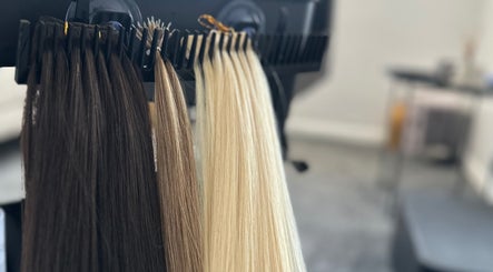 Hair extensions display at Hair By Ayesha, Daventry, England, GB. Showcasing diverse shades and quality.