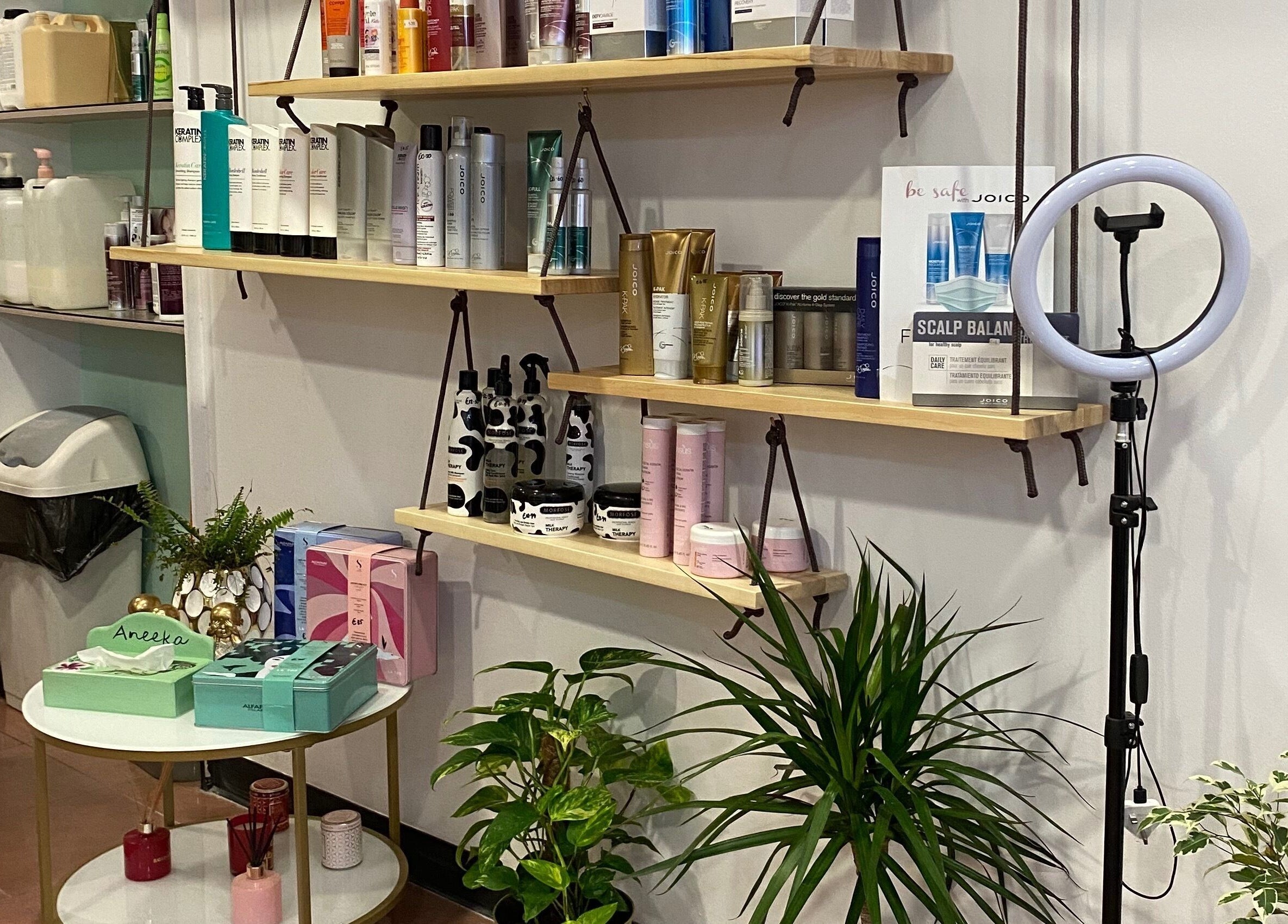 Beauty products displayed on shelves at Do or Dye by Aneeka, Birkirkara, MT.