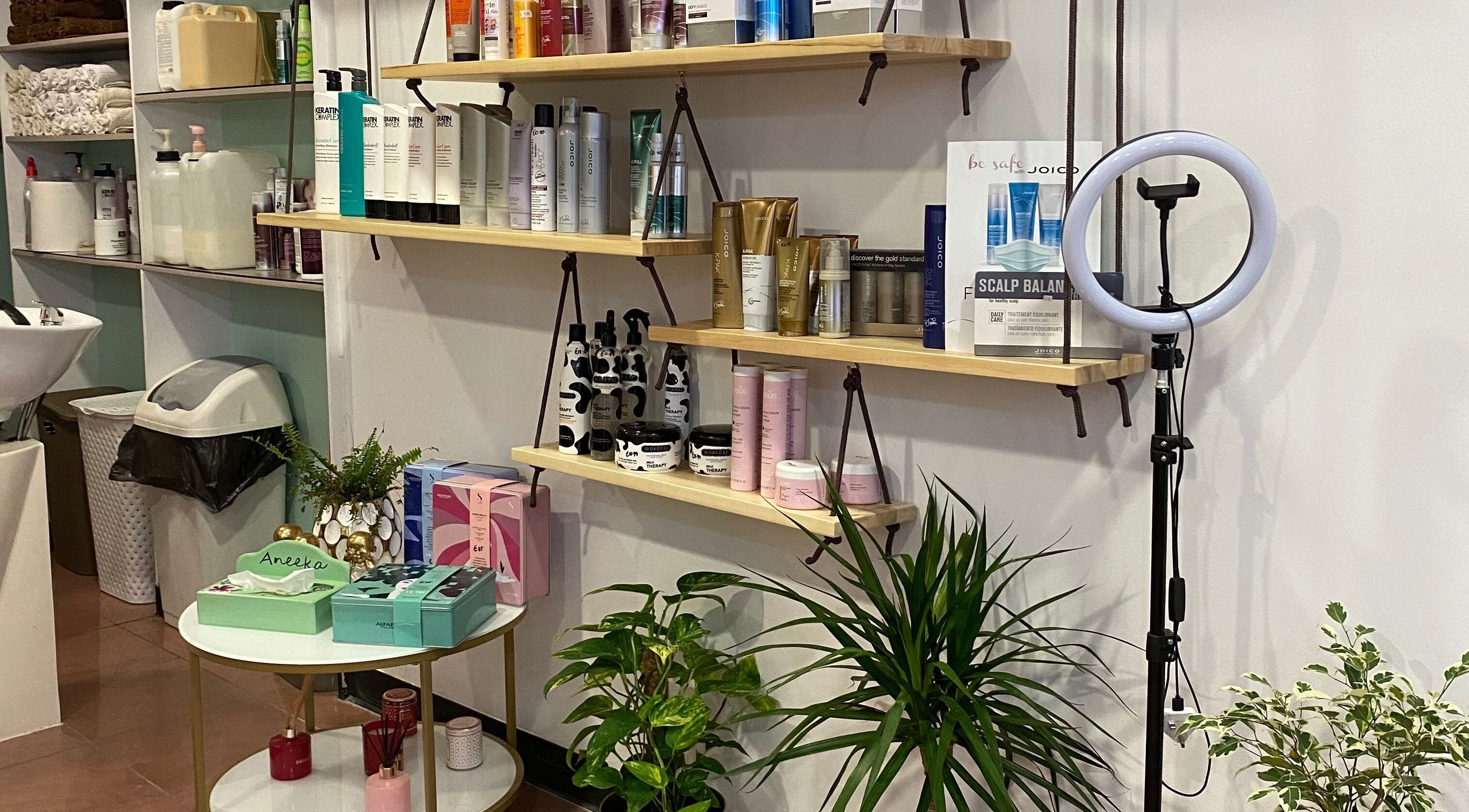 Beauty products displayed on shelves at Do or Dye by Aneeka, Birkirkara, MT.
