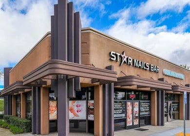 Exterior of Star Nails Bar, a beauty venue in Vista, California, US with stylish architectural design.