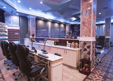 Chic interior of Star Nails Bar in Vista, California, US, showcasing elegant manicure stations and vibrant decor.