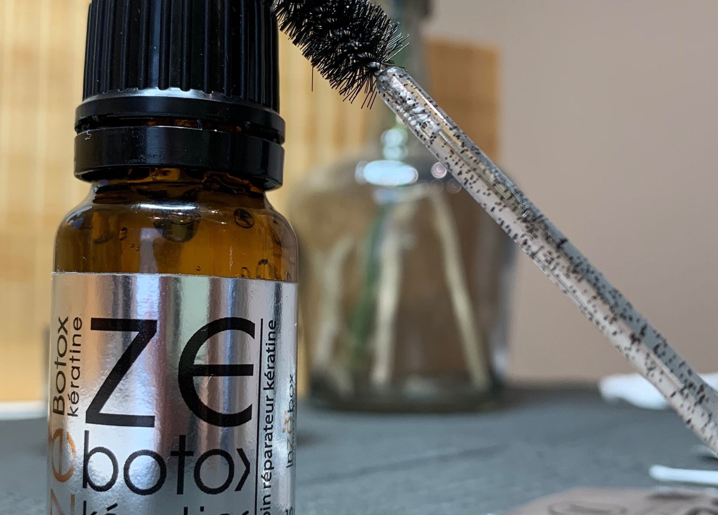 Bouteille de soin kératine chez Studio Beauté by Julie, Théville, Normandie, FR pour cheveux éclatants.