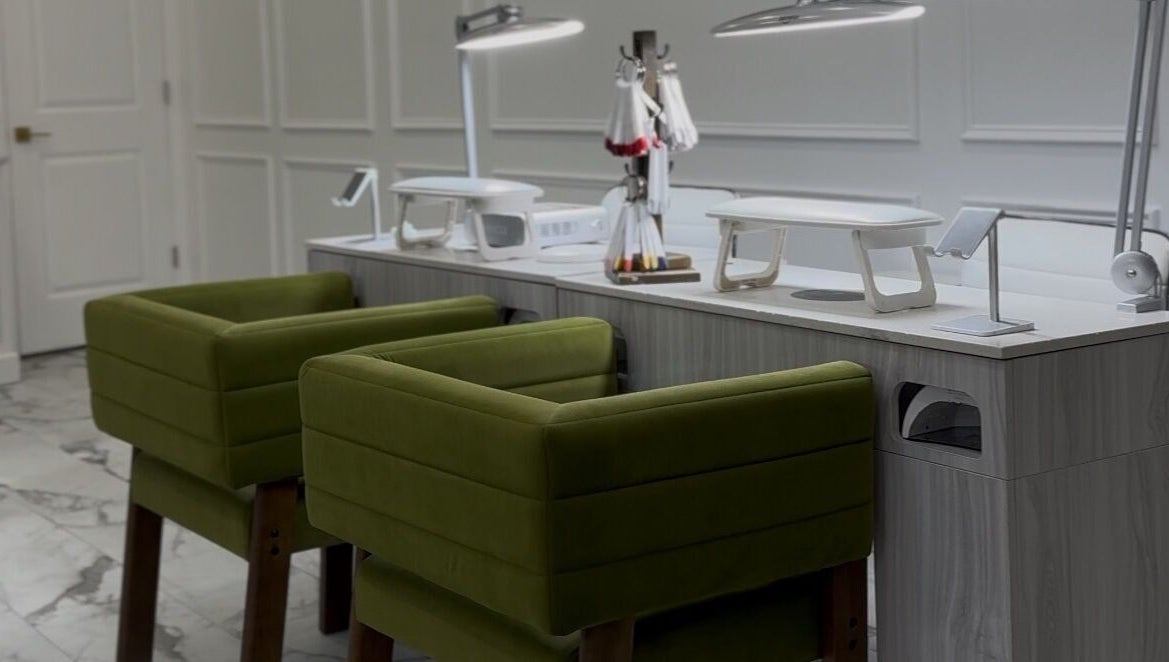 Chic nail station at Afina Beauty Studio, New York, New York, US, showcasing modern design and comfort.