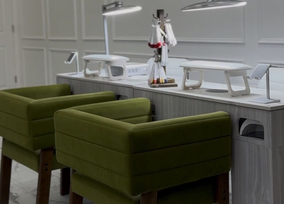 Chic nail station at Afina Beauty Studio, New York, New York, US, showcasing modern design and comfort.