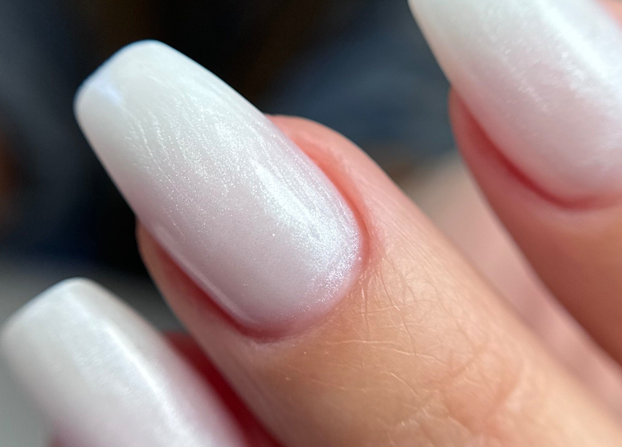 Elegant white nails at Afina Beauty Studio, New York, New York, US.