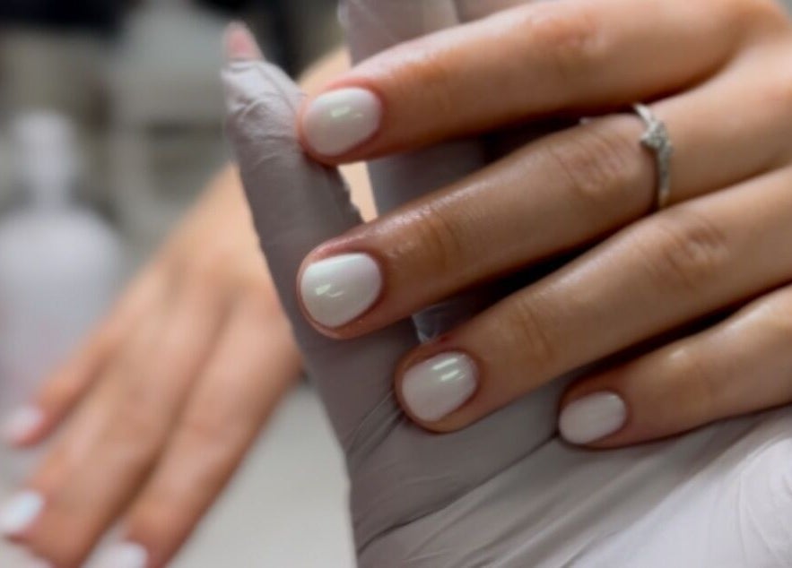 Manicure at Afina Beauty Studio, New York, New York, US with white polish.