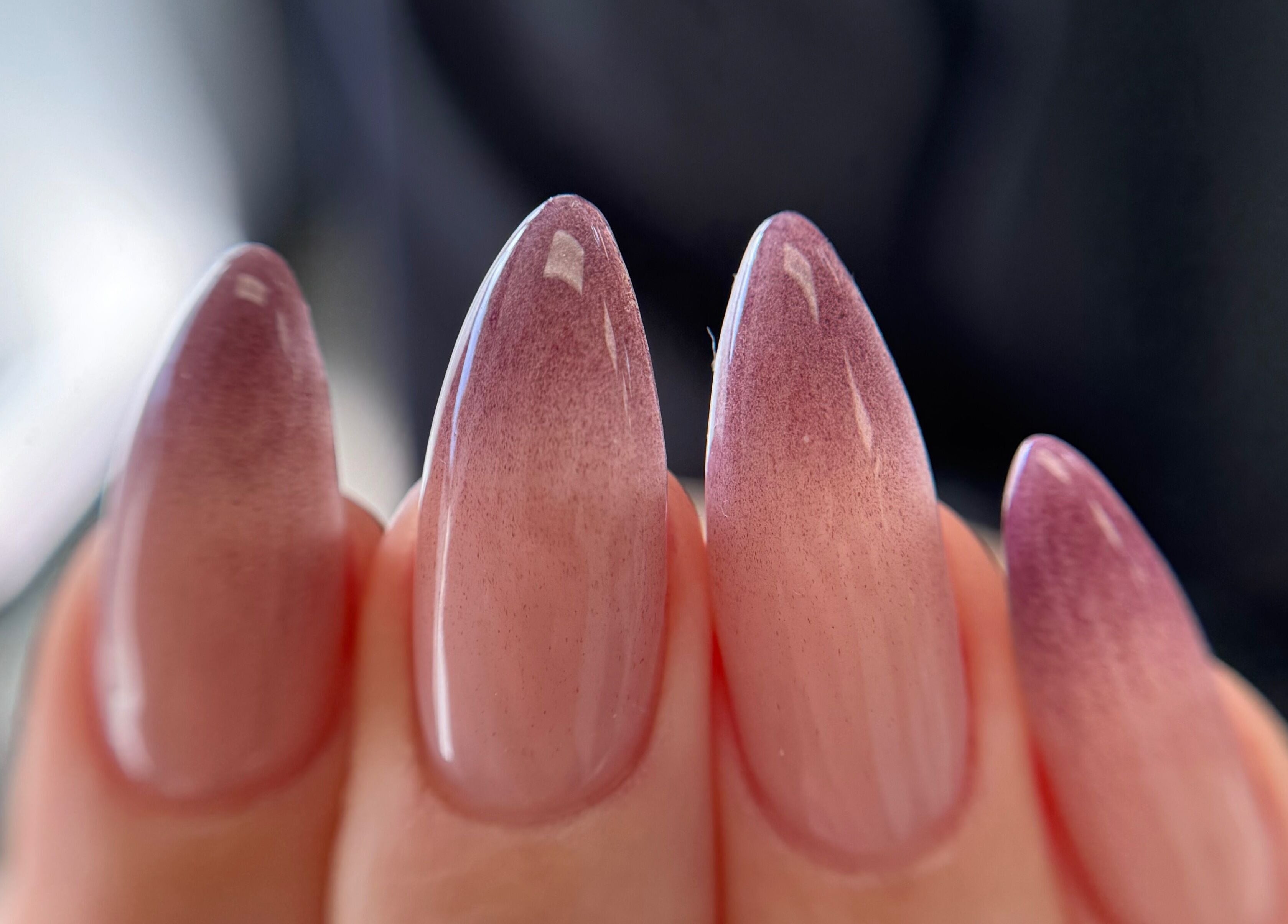 Close-up of elegant ombre nails at Afina Beauty Studio, New York, New York, US.