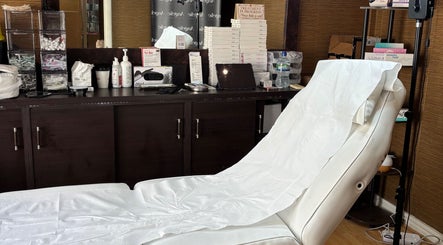 Elegant treatment room setup at Angelic Aesthetics and Cosmetics, Canterbury, England, GB with tools and chair.
