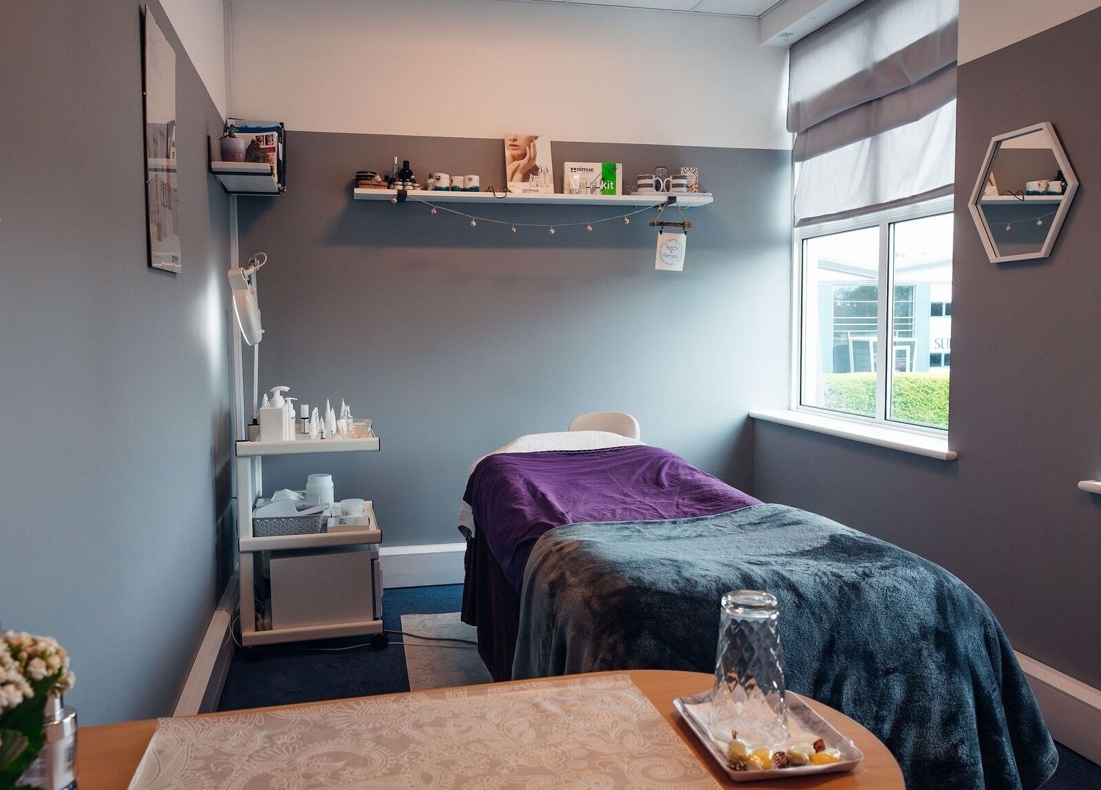 Tranquil treatment room at Relax & Remedy, Ferndown, England, GB, with serene decor and ambient lighting.