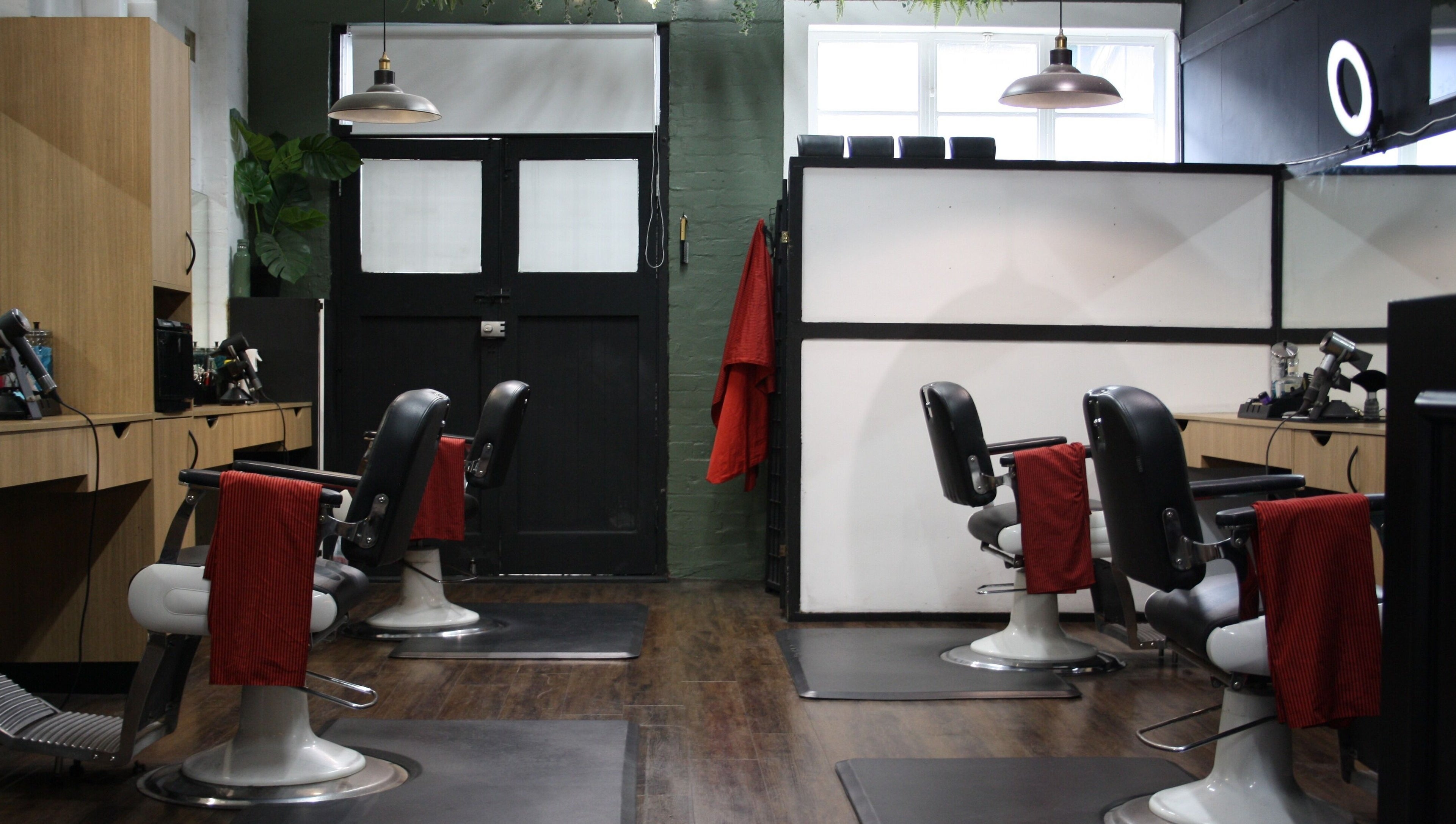 Barber chairs at The Barber Blueprint, Nundah, Queensland, AU. Modern and inviting setup.