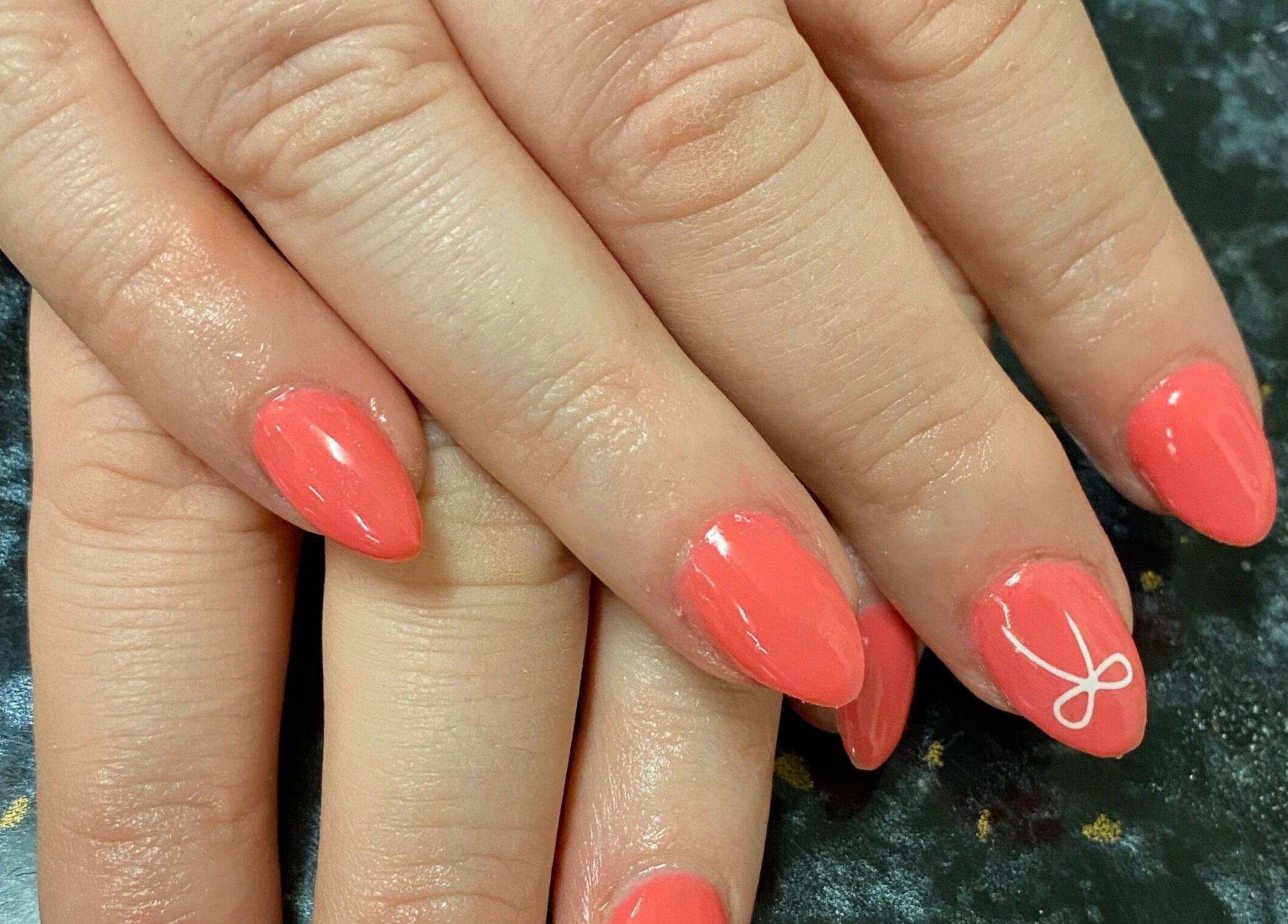 Coral manicured nails at Embellish Lashes & Beauty / Onjnue in Portland, Victoria, AU.