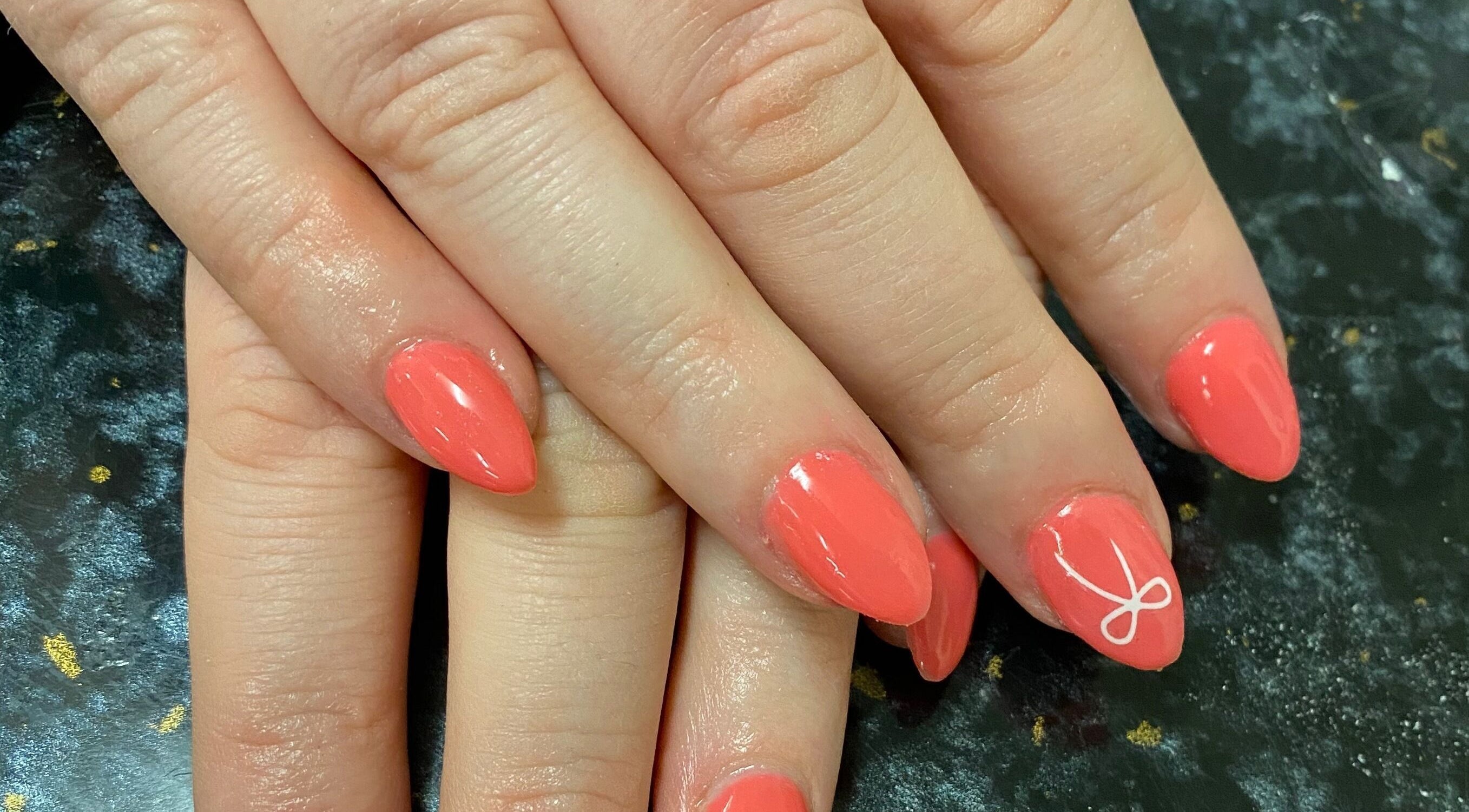 Coral manicured nails at Embellish Lashes & Beauty / Onjnue in Portland, Victoria, AU.