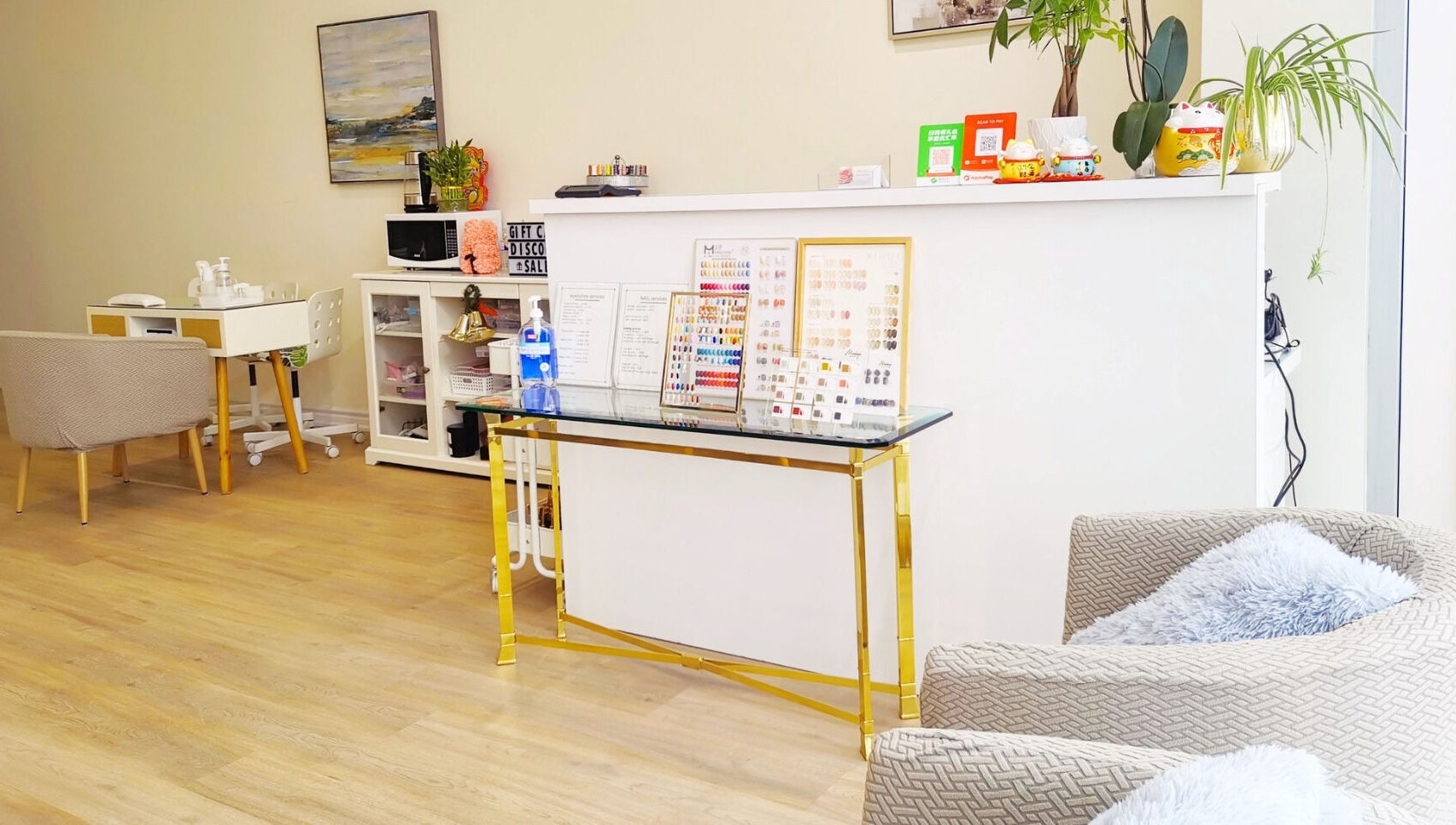 Modern interior of MiuMiu Beauty Nails And Eyelashes in Toronto, Ontario, CA showcasing nail services area.