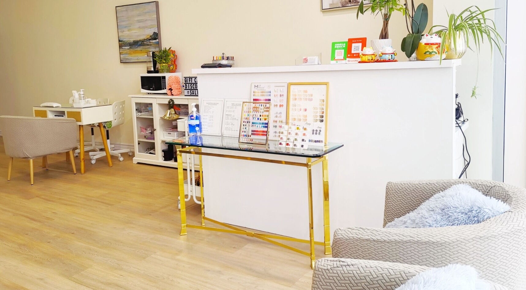 Modern interior of MiuMiu Beauty Nails And Eyelashes in Toronto, Ontario, CA showcasing nail services area.