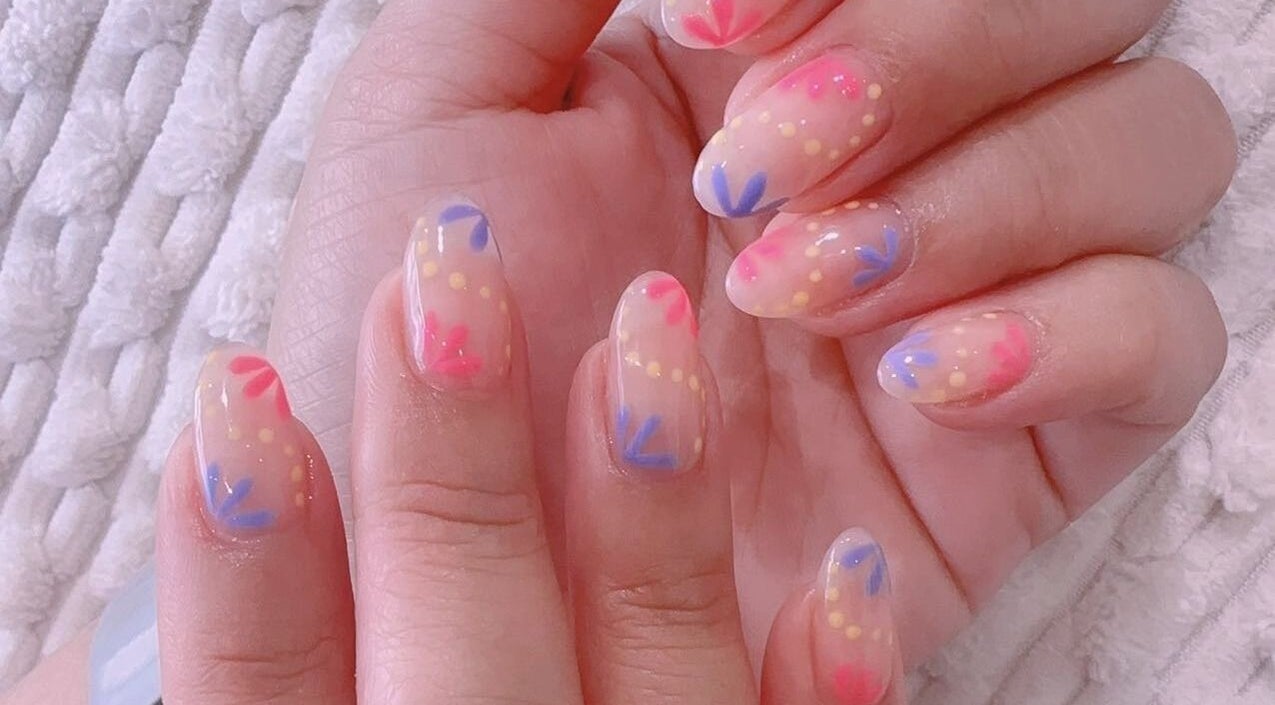 Colorful dot and line nail art at MiuMiu Beauty Nails And Eyelashes, Toronto, Ontario, CA.