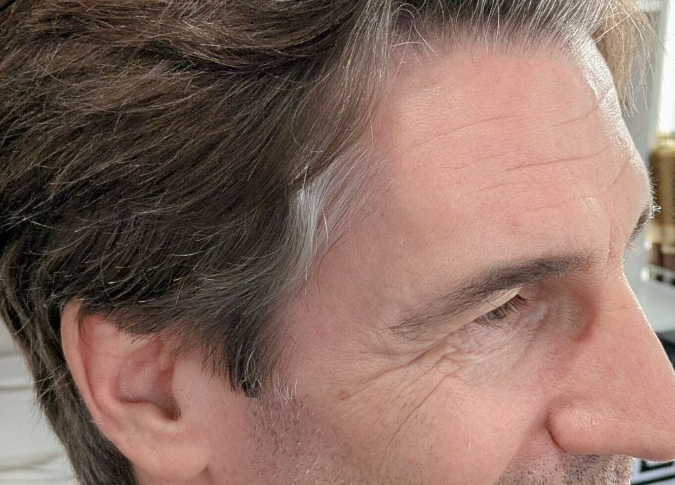 Close-up of a stylish men's haircut at Planet Stella hair salon, North Miami Beach, Florida, US.